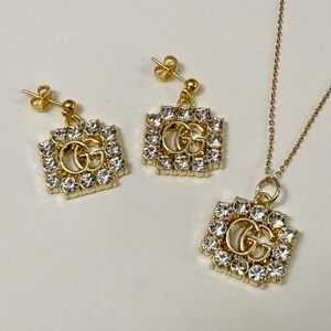 GUCCI Gold-Tone Crystal GG Stamped Pendant Necklace and Earrings Set